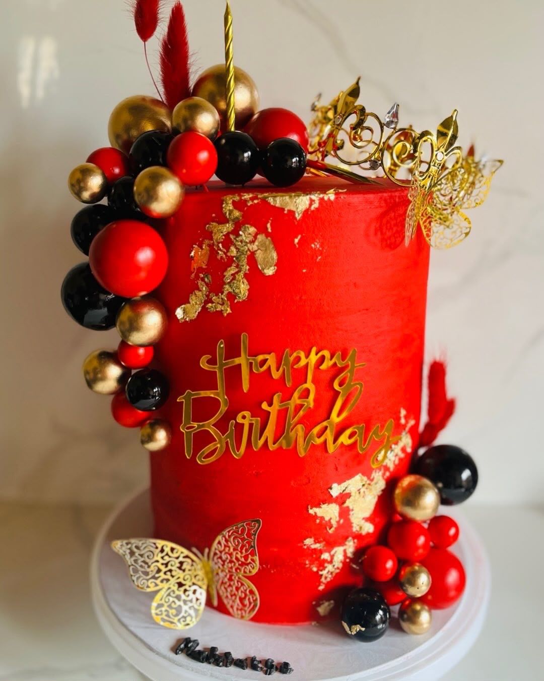 Red & Gold Crown Cake by Baked by Buhlebenkosi