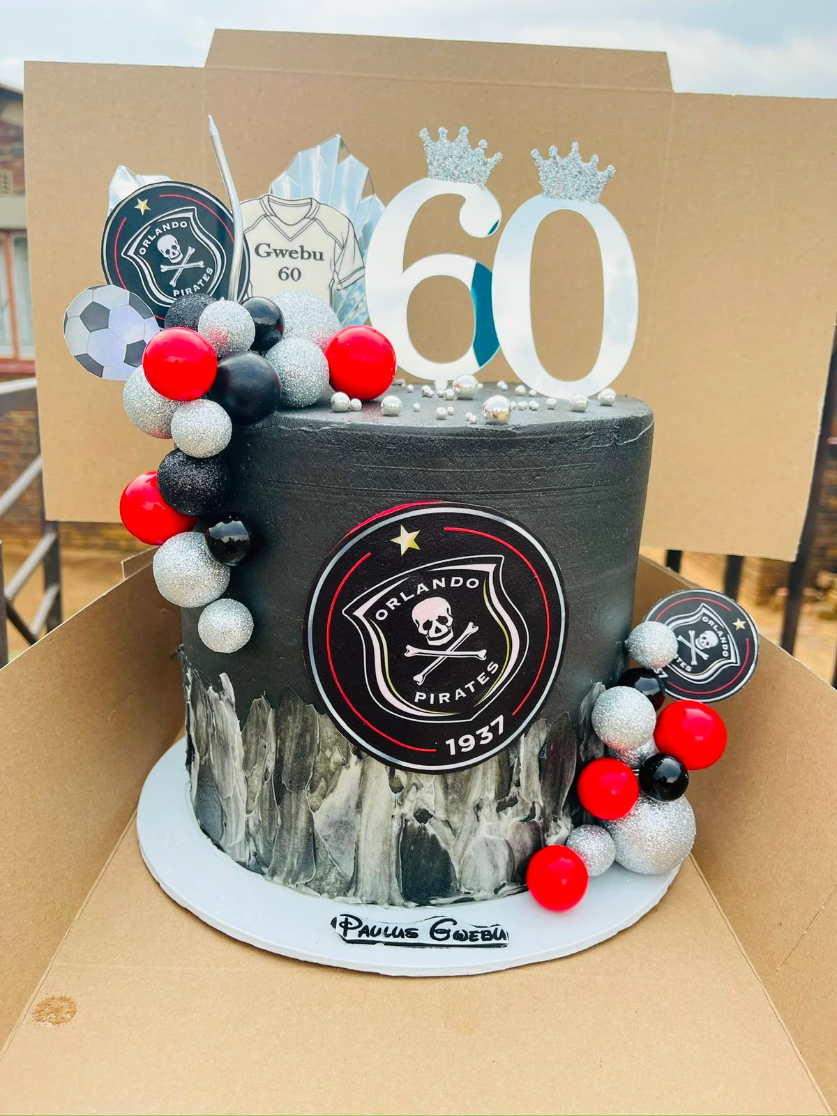 Pirates Black 60th Cake by Baked by Buhlebenkosi