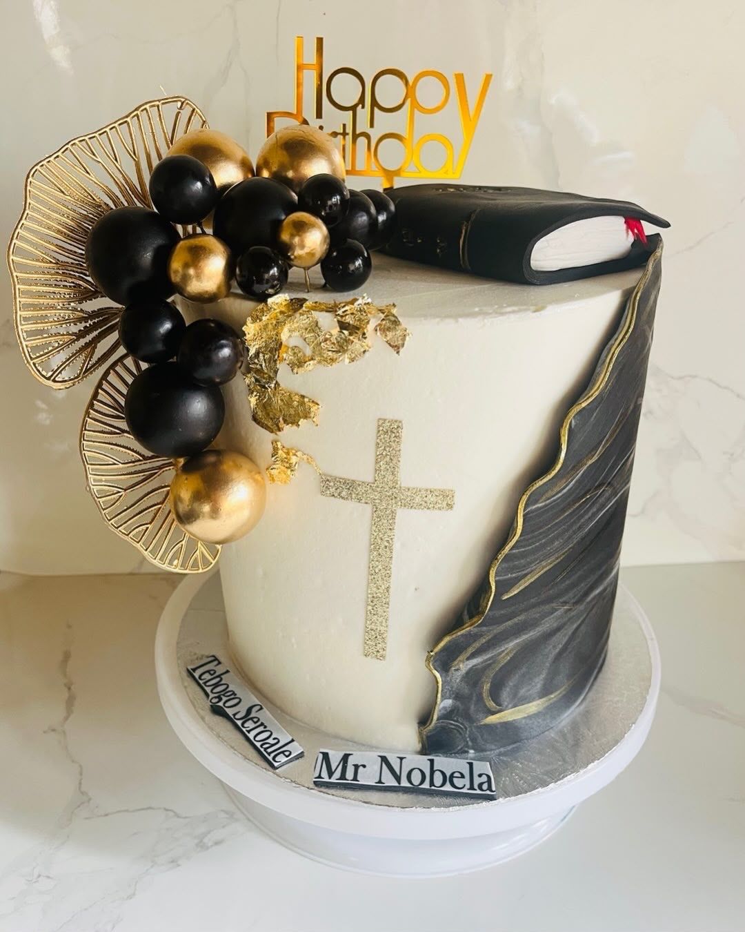 Black & Gold Faith Cake by Baked by Buhlebenkosi