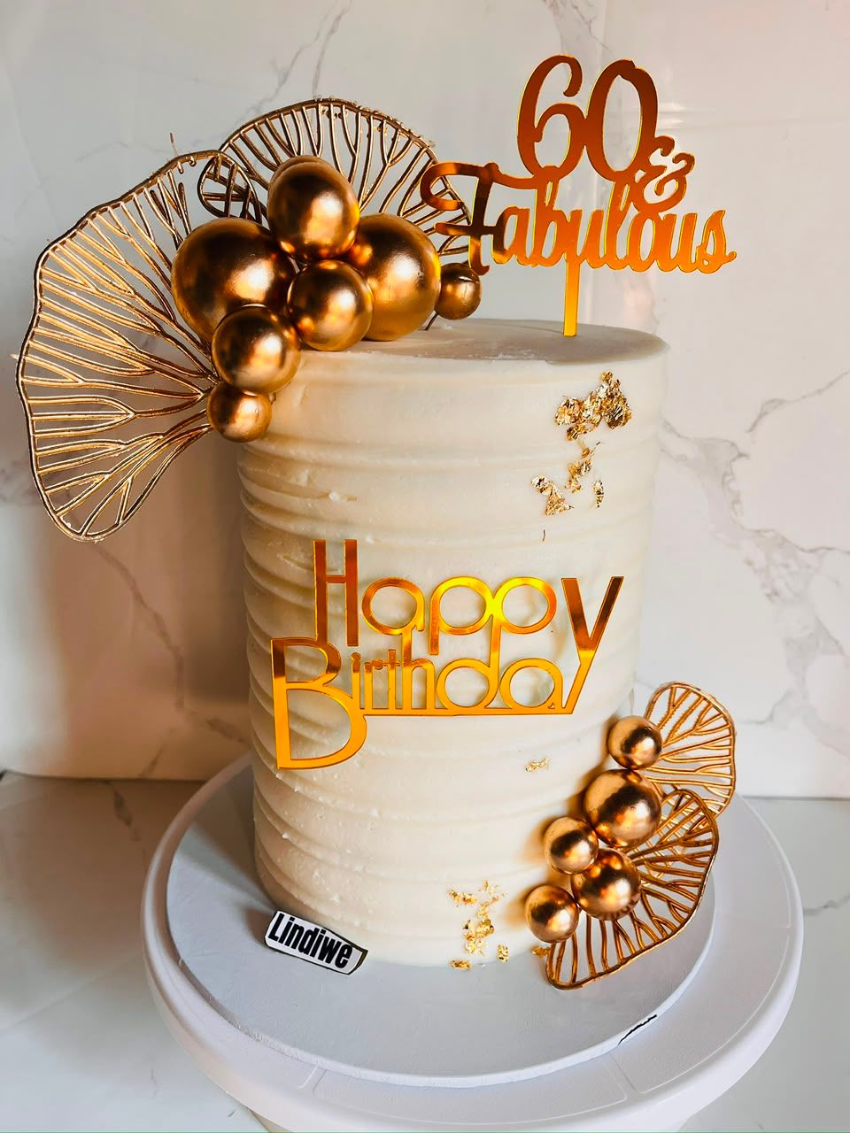 White Gold 60th Cake by Baked by Buhlebenkosi