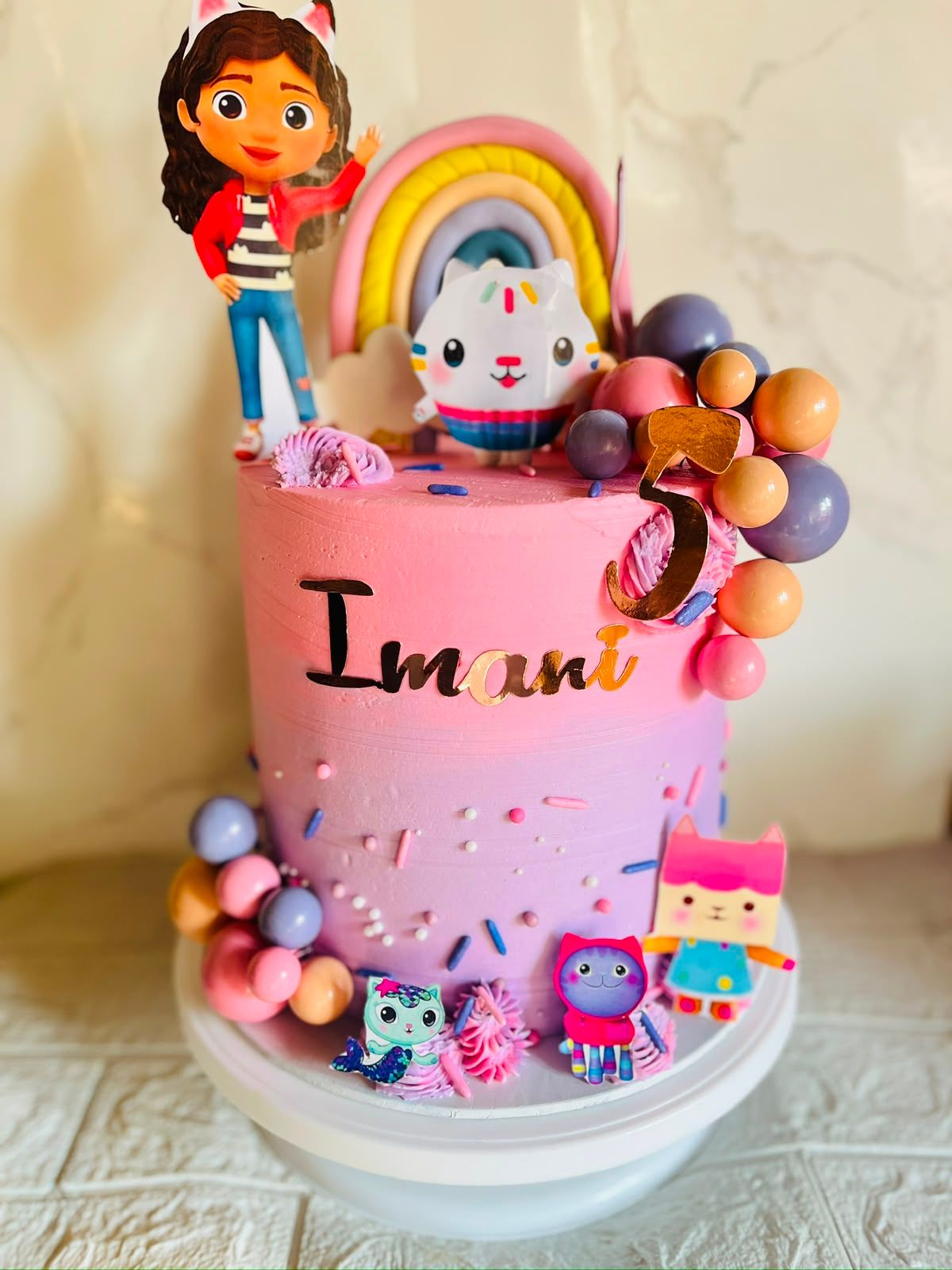 Gabby's Dollhouse Cake by Baked by Buhlebenkosi