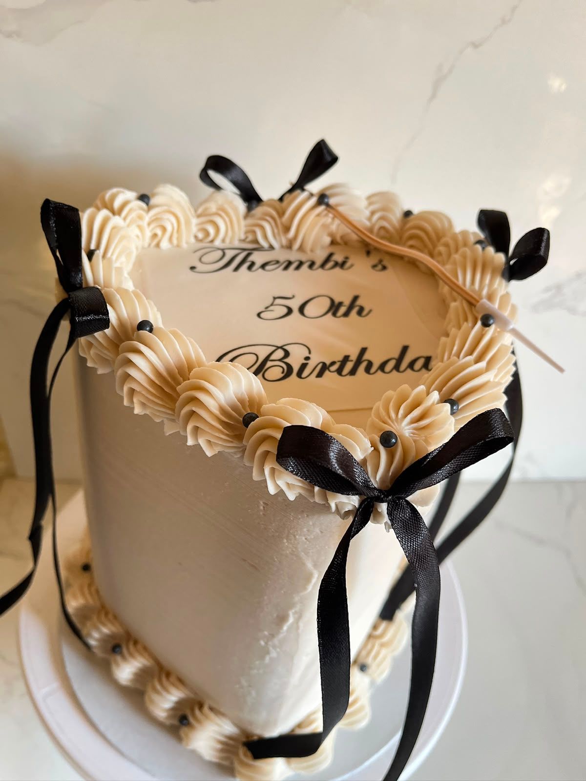 Ivory 50th Bow Mini Cake by Baked by Buhlebenkosi