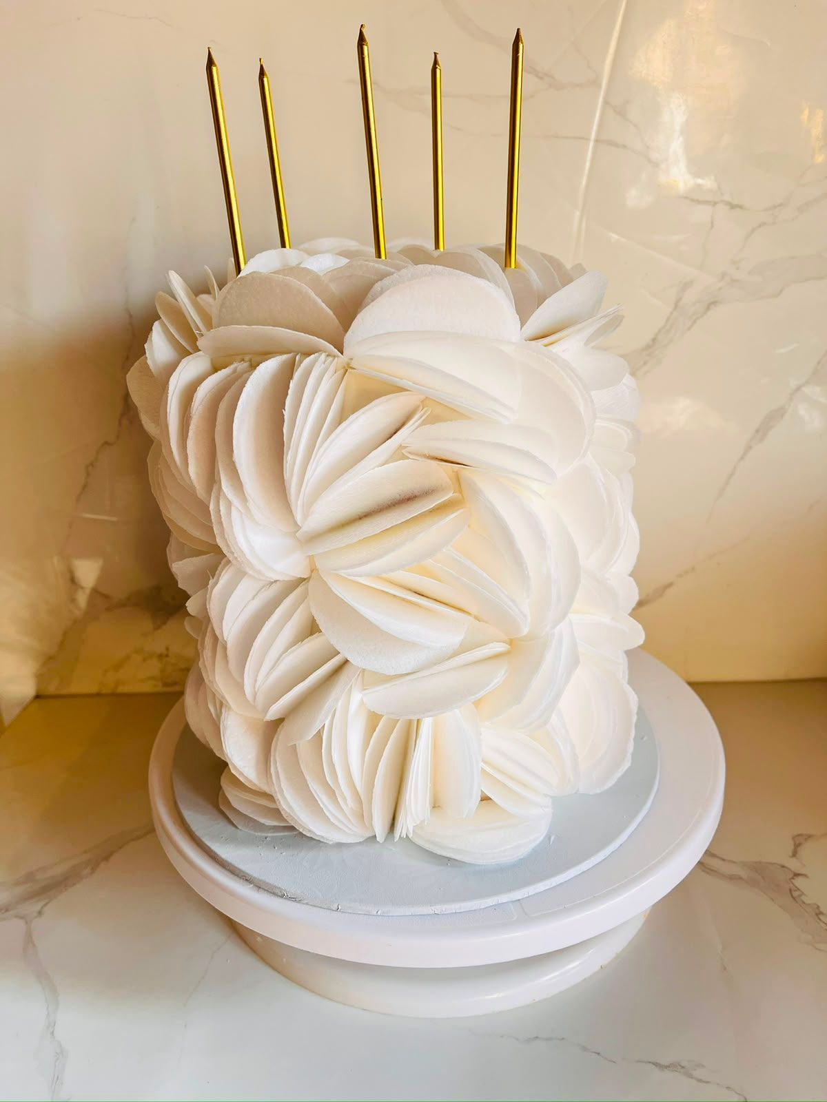 White Petal Ruffle Mini Cake by Baked by Buhlebenkosi