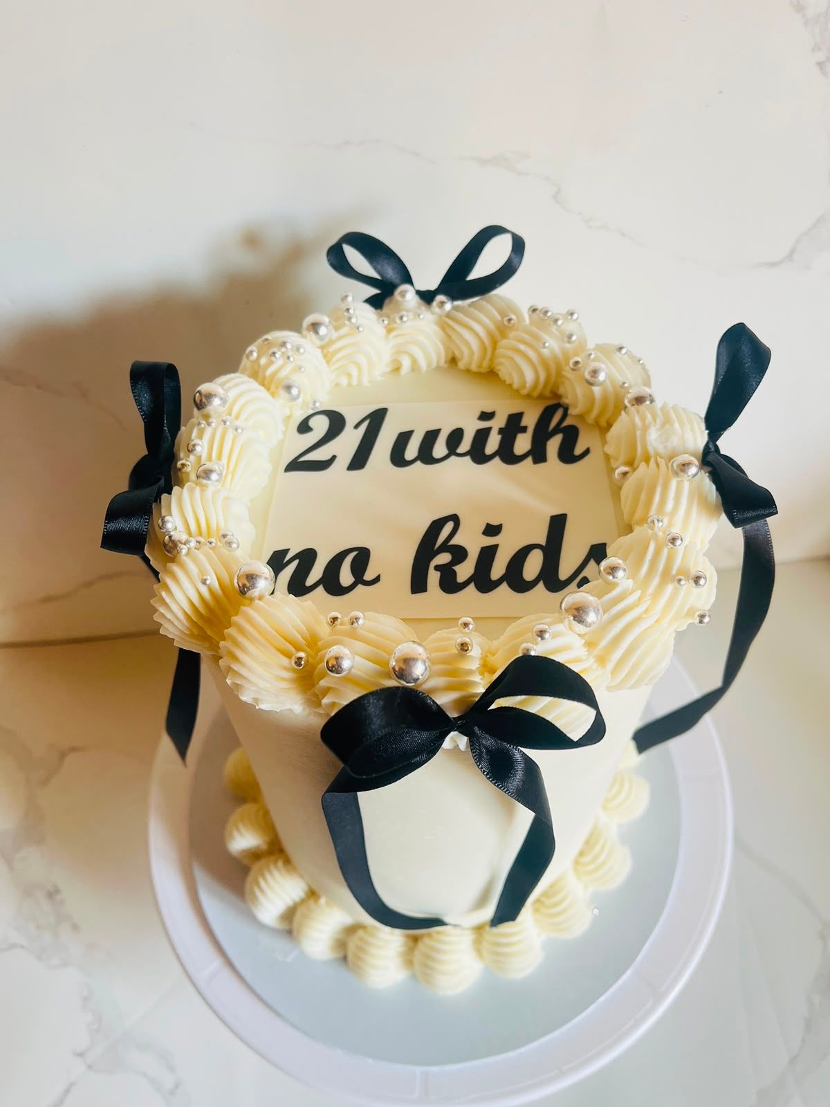 Cheeky 21st Mini Cake by Baked by Buhlebenkosi
