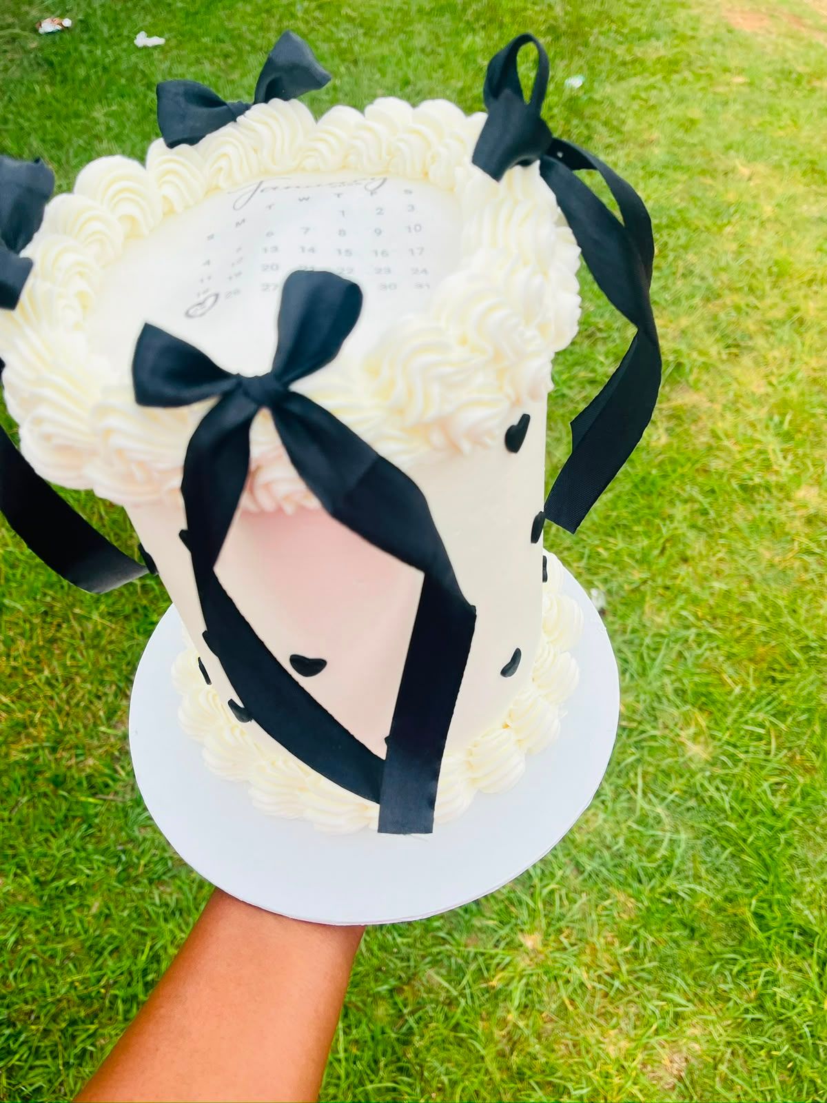 White Calendar Heart Mini Cake by Baked by Buhlebenkosi