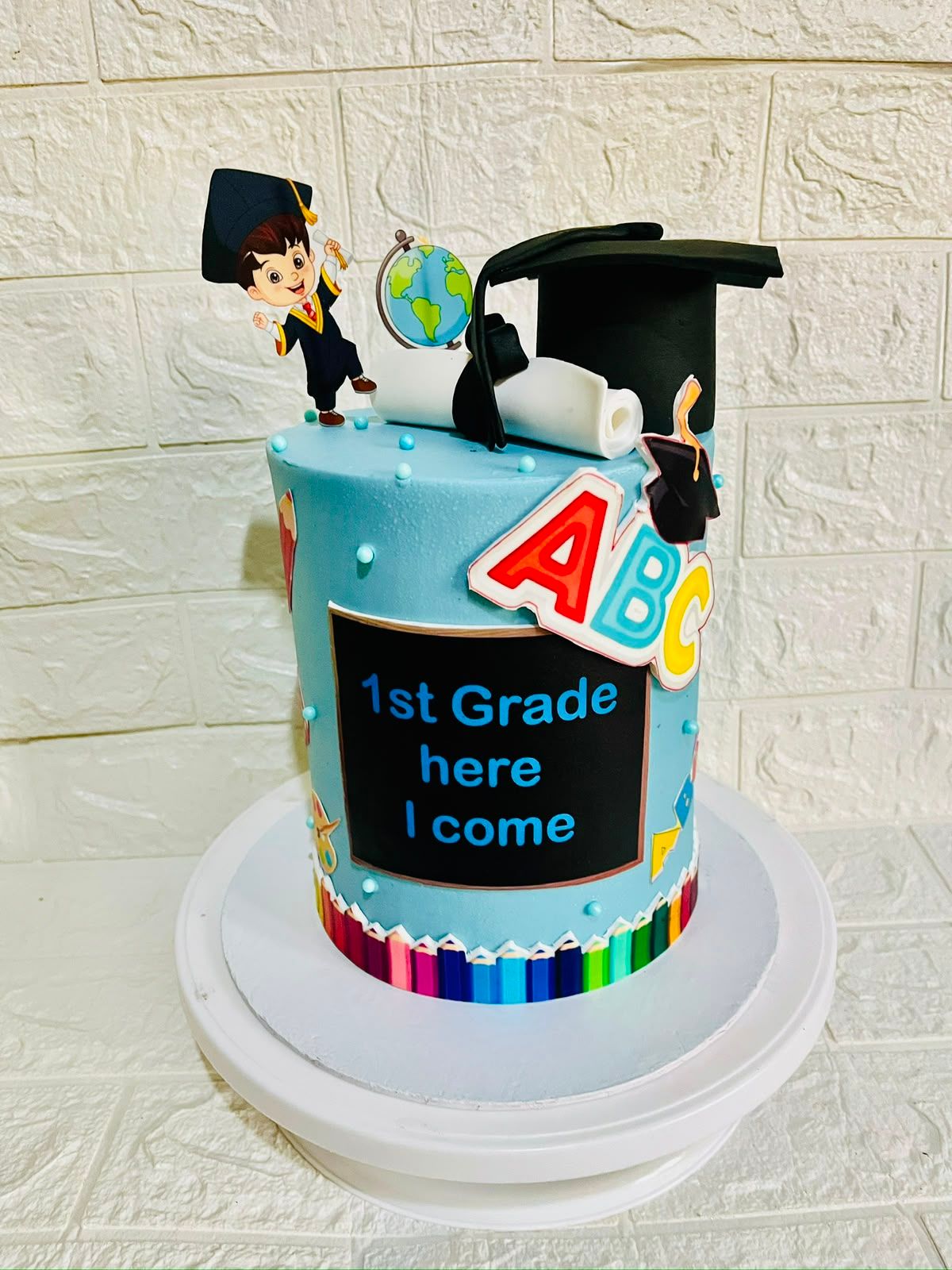 First Grade Grad Cake by Baked by Buhlebenkosi
