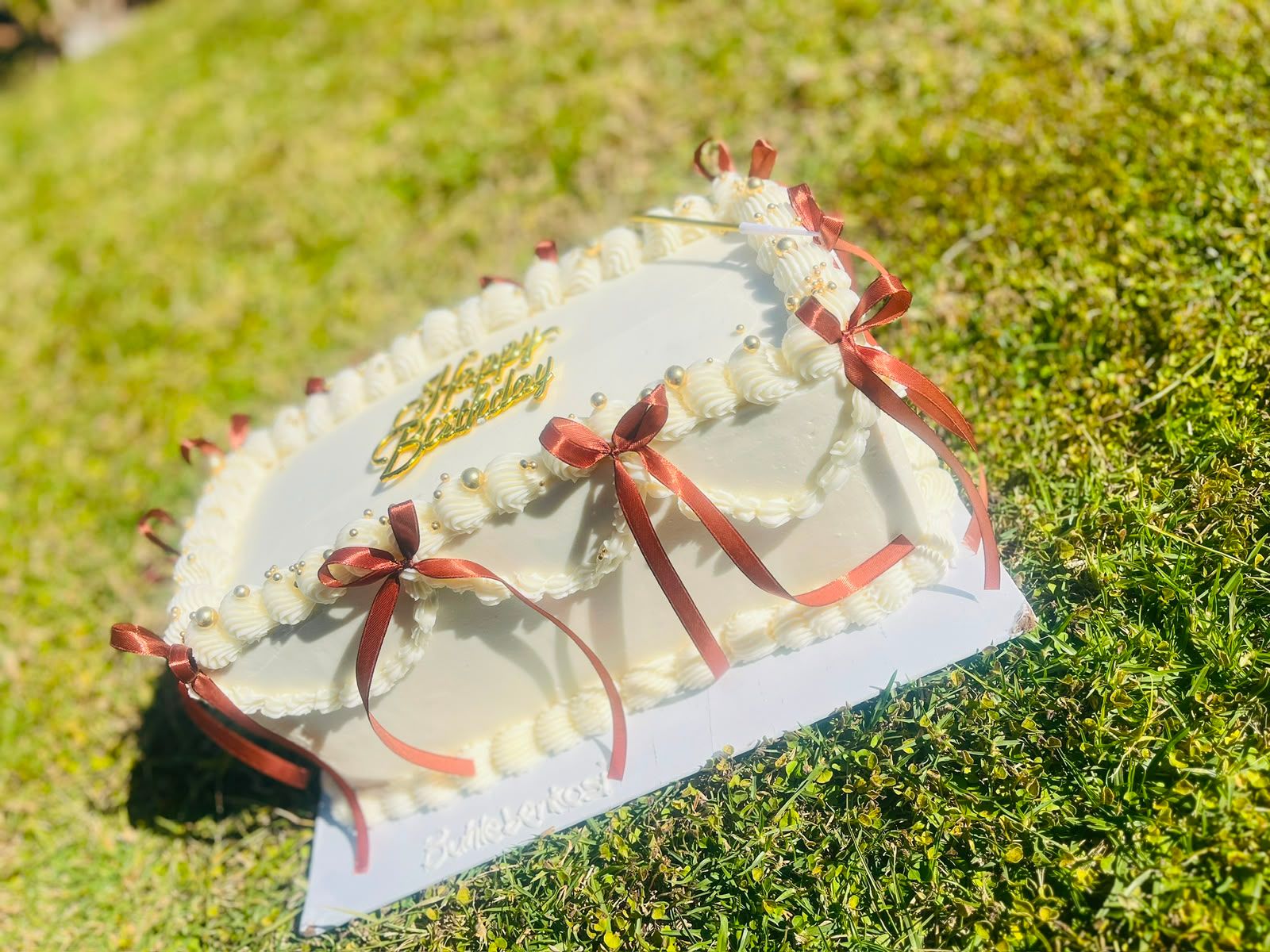 Ivory Ribbon Slab Cake by Baked by Buhlebenkosi