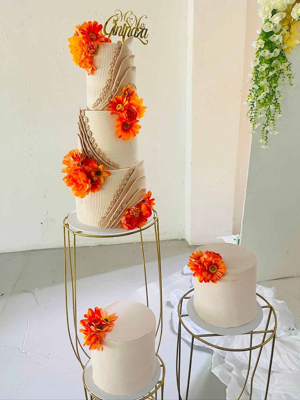 Orange Gerbera Wedding Cake by Baked by Buhlebenkosi