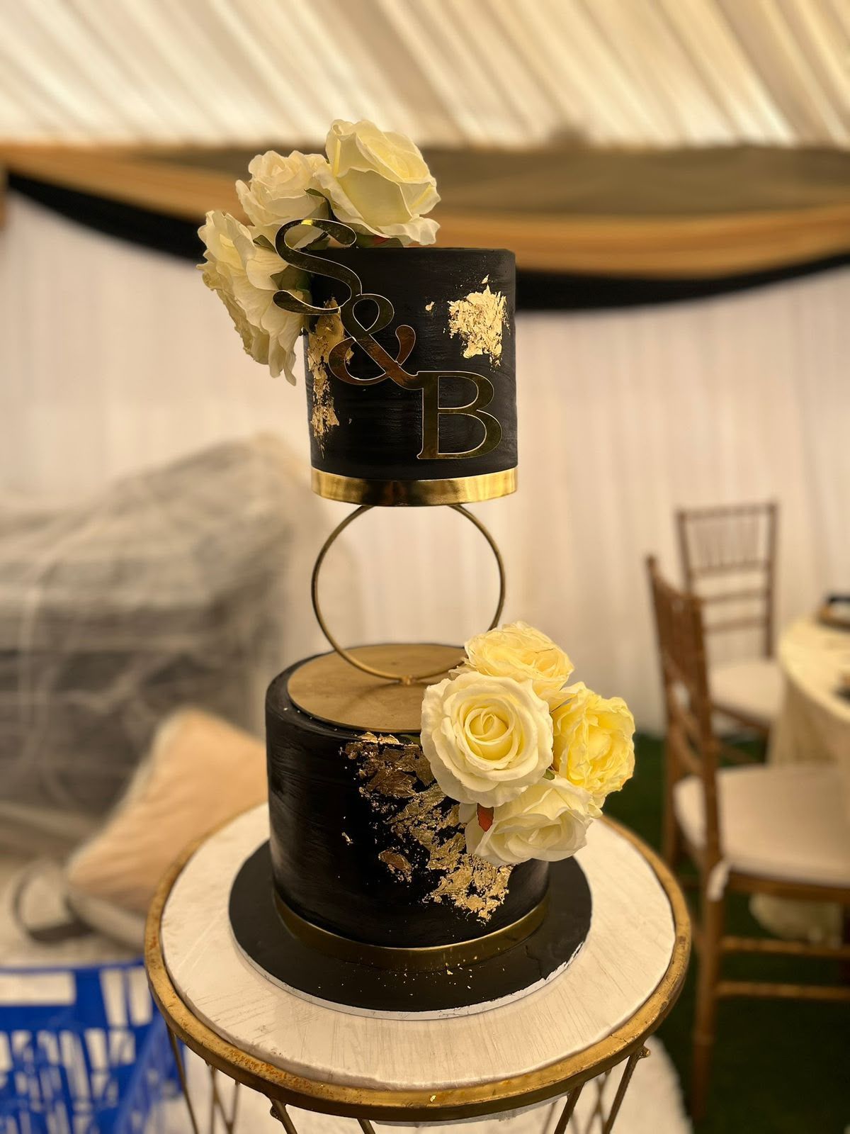 Black Gold Floating Cake by Baked by Buhlebenkosi
