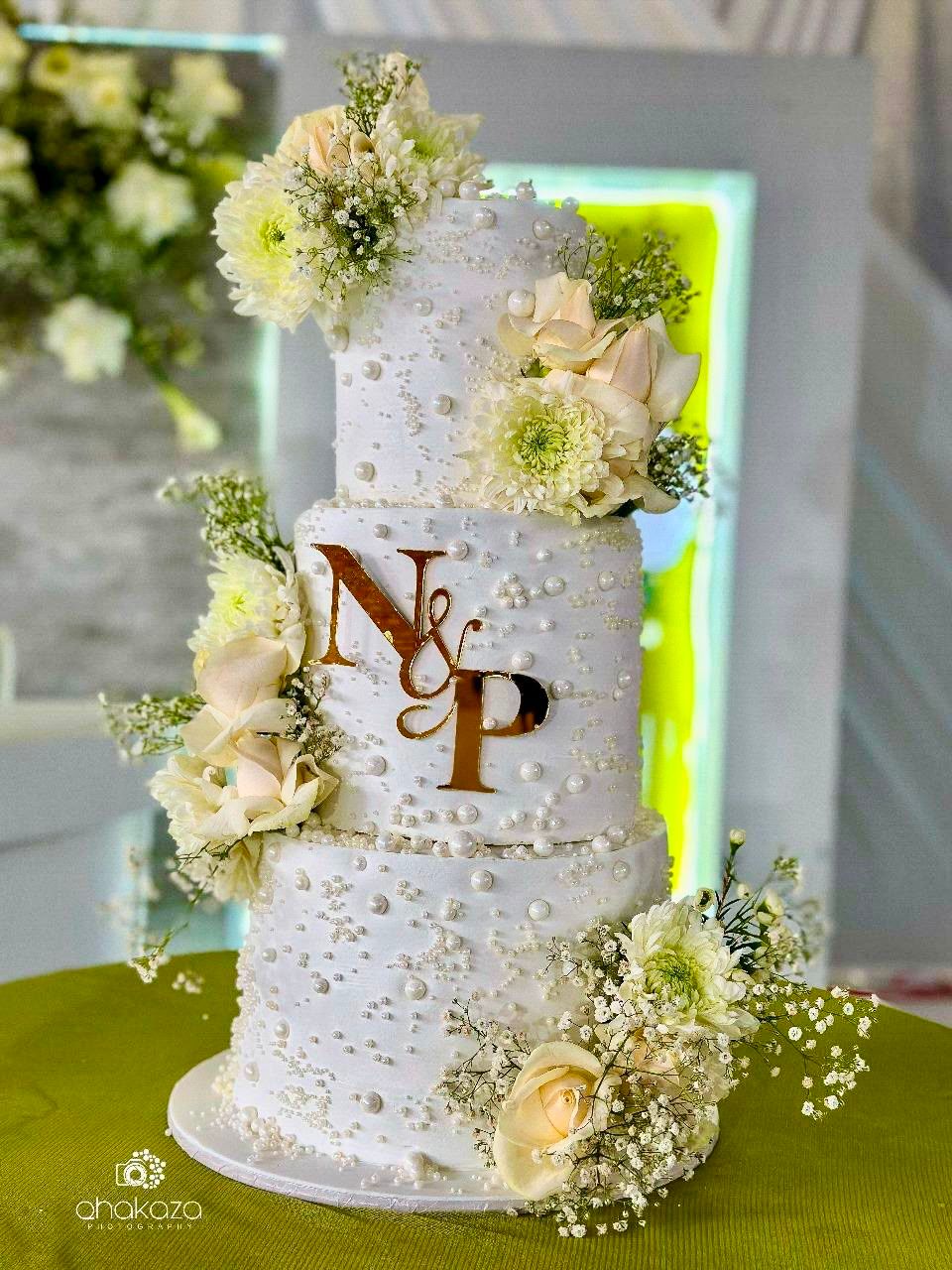 White Pearl Bloom Cake by Baked by Buhlebenkosi