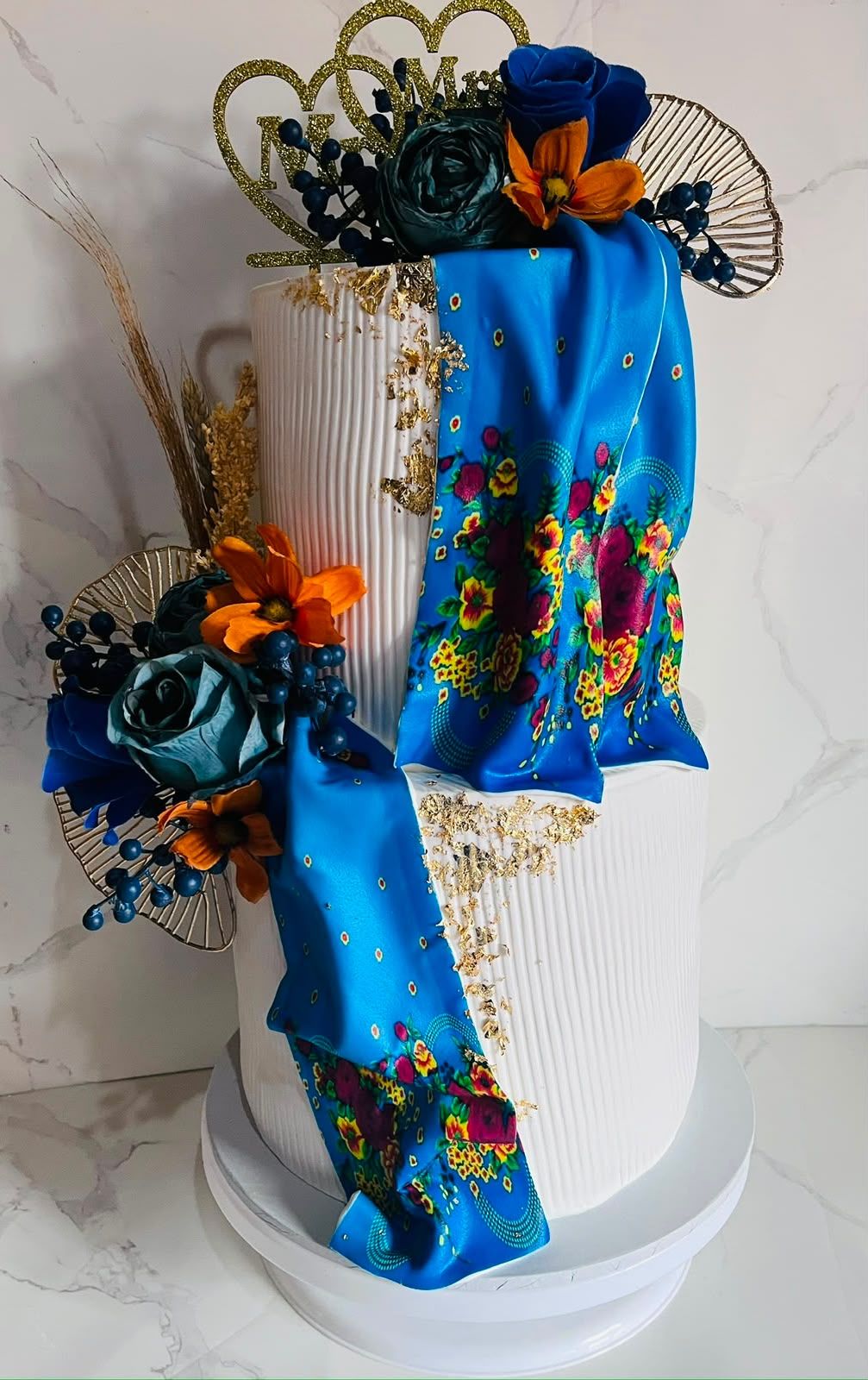 Blue Shweshwe Wedding Cake by Baked by Buhlebenkosi